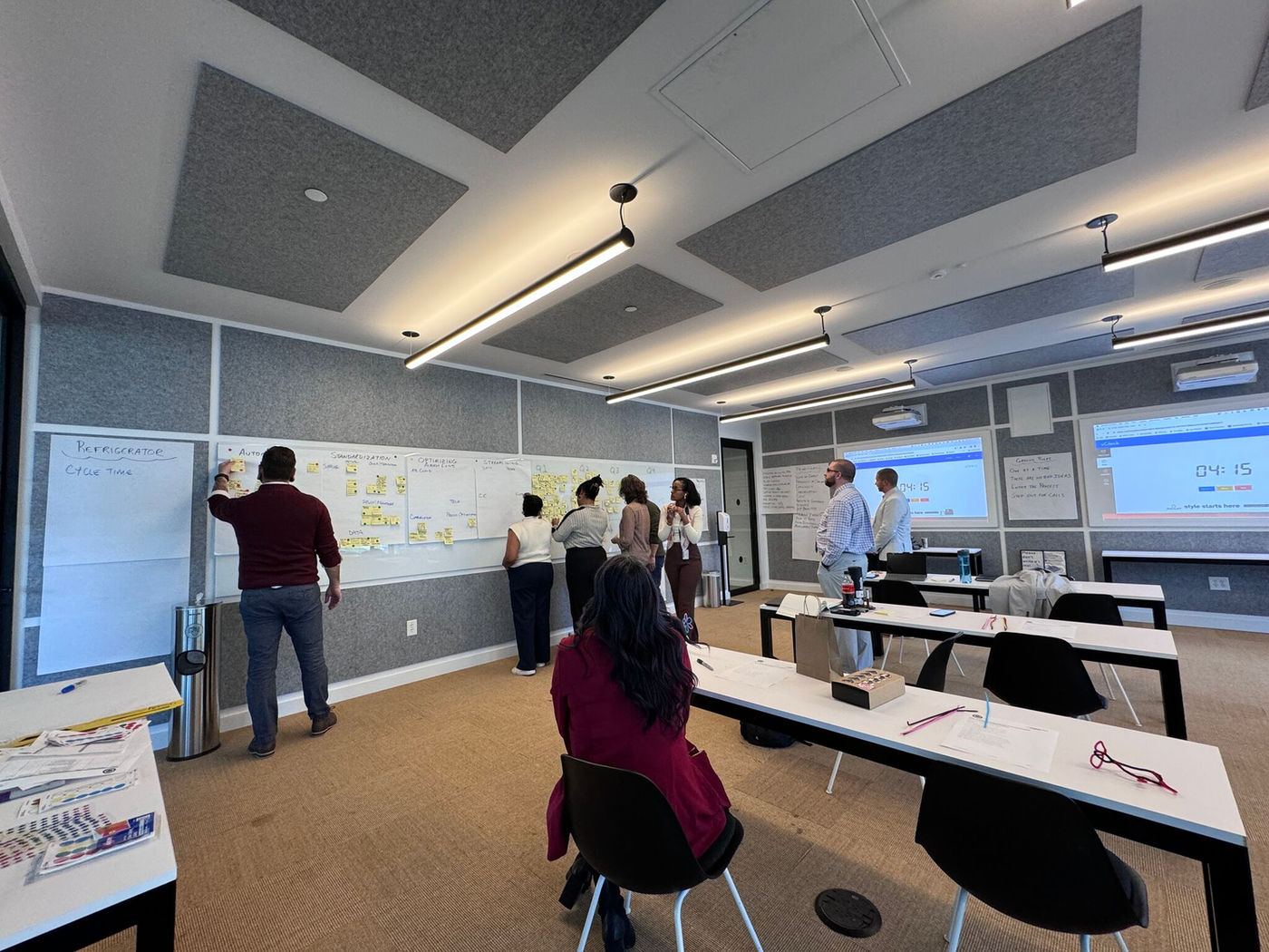 APG team collaborating in a workshop space